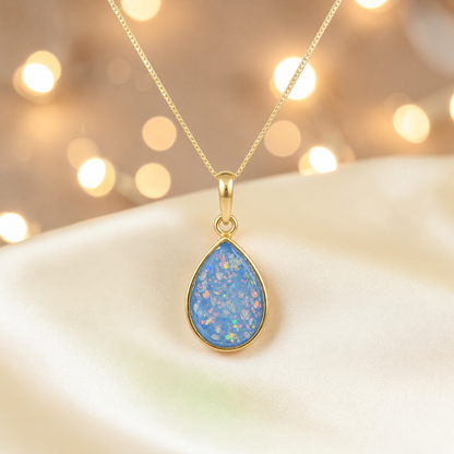 Baby blue Golden Whisper 9ct gold pendant, handcrafted in Lancashire UK – by Keepsake Memorial Jewellery