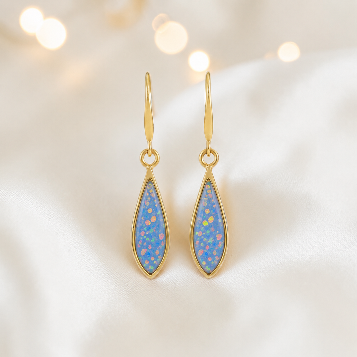 Baby Blue Luz 9ct gold tear drop earrings, handcrafted in Lancashire, UK – by Keepsake Memorial Jewellery