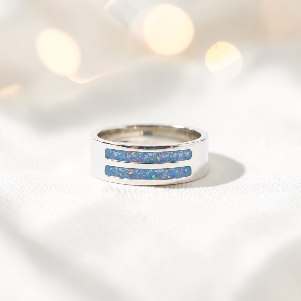 Baby blue Strata men's sterling silver double channel memorial ring, wide comfort-fit band, handcrafted in Lancashire UK by Keepsake Memorial Jewellery