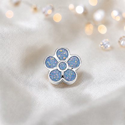 Baby blue sterling silver flora, flower ashes memorial charm, handcrafted in Lancashire by keepsake memorial