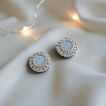 Halo's memorial stud earrings in Baby Blue opal — sterling silver, handcrafted in Lancashire, UK