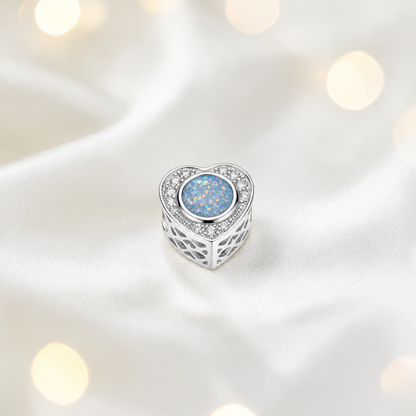 Baby blue sterling silver heart of memories ashes memorial charm, handcrafted in Lancashire by keepsake memorial
