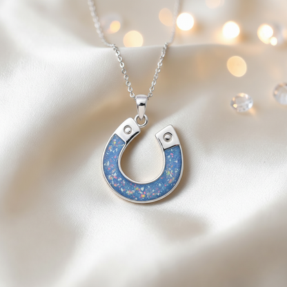 Midnight horseshoe ashes pendant in baby blue, handcrafted in Lancashire UK - by Keepsake Memorial Jewellery
