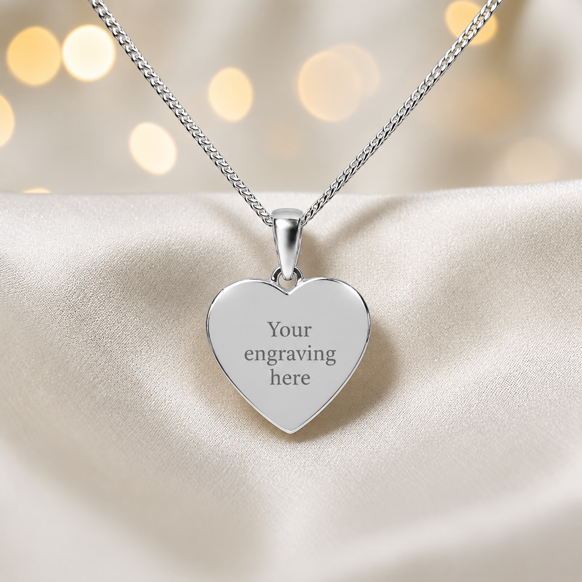 keepsake memorial silver ashes heart pendant engraved, handcrafted in Lancashire