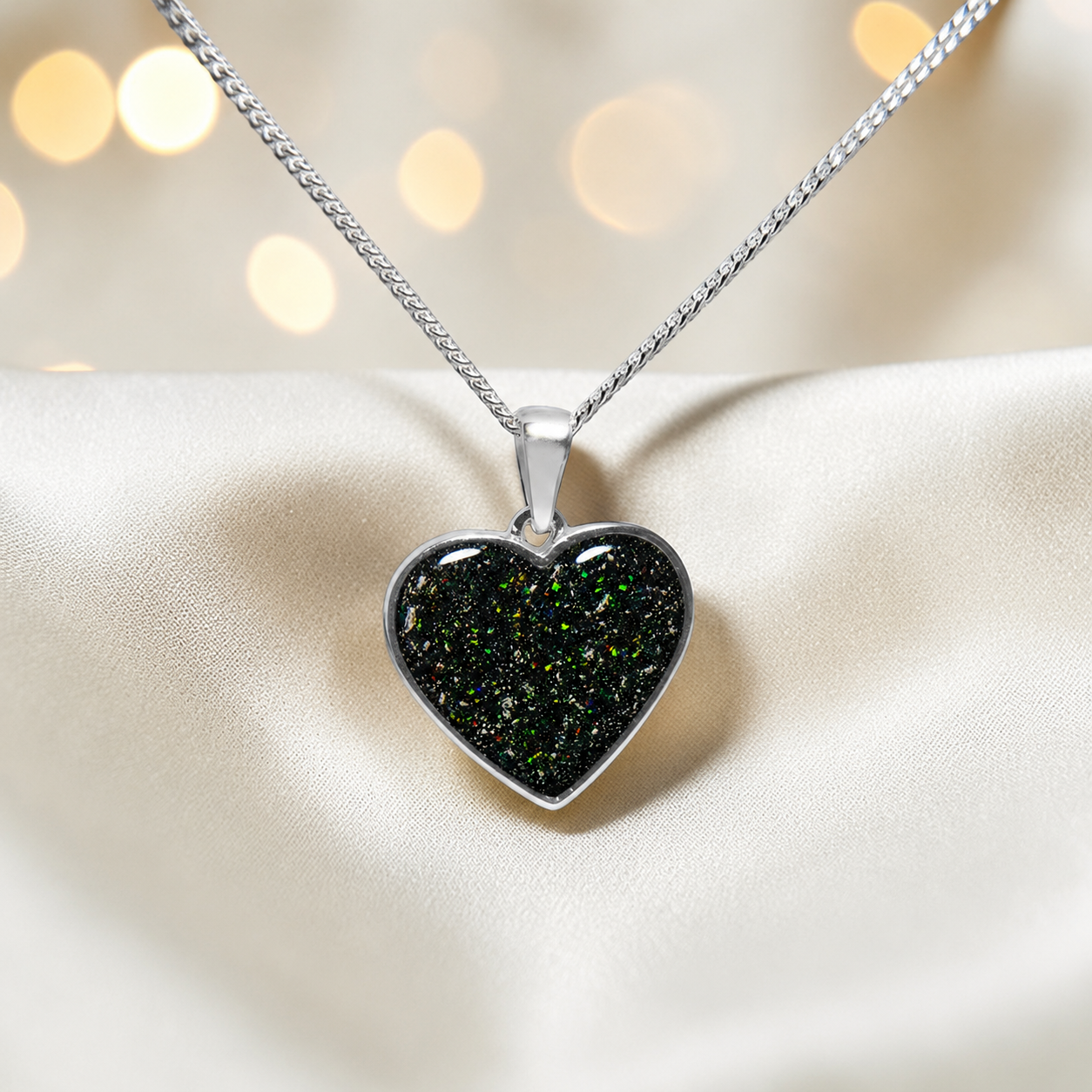 Silver Betel heart ashes memorial pendant in Black Flame, handcrafted in Lancashire UK