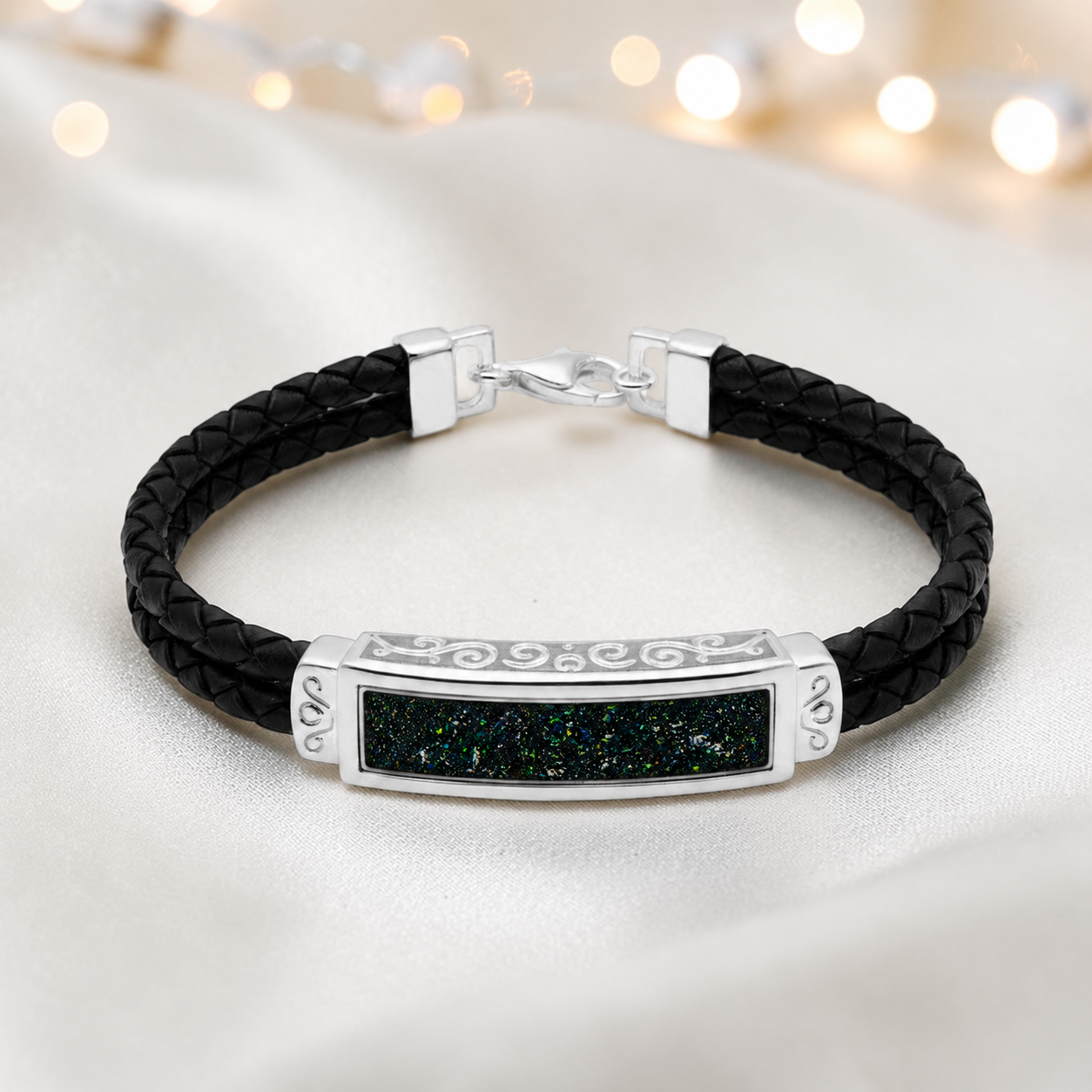 Black flame Sentinel men's sterling silver and leather memorial bracelet , handcrafted in Lancashire UK by Keepsake Memorial Jewellery
