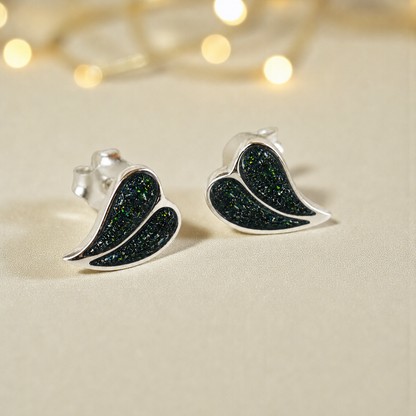 Two Hearts memorial stud earrings in Black Flame opal — sterling silver, handcrafted in Lancashire, UK