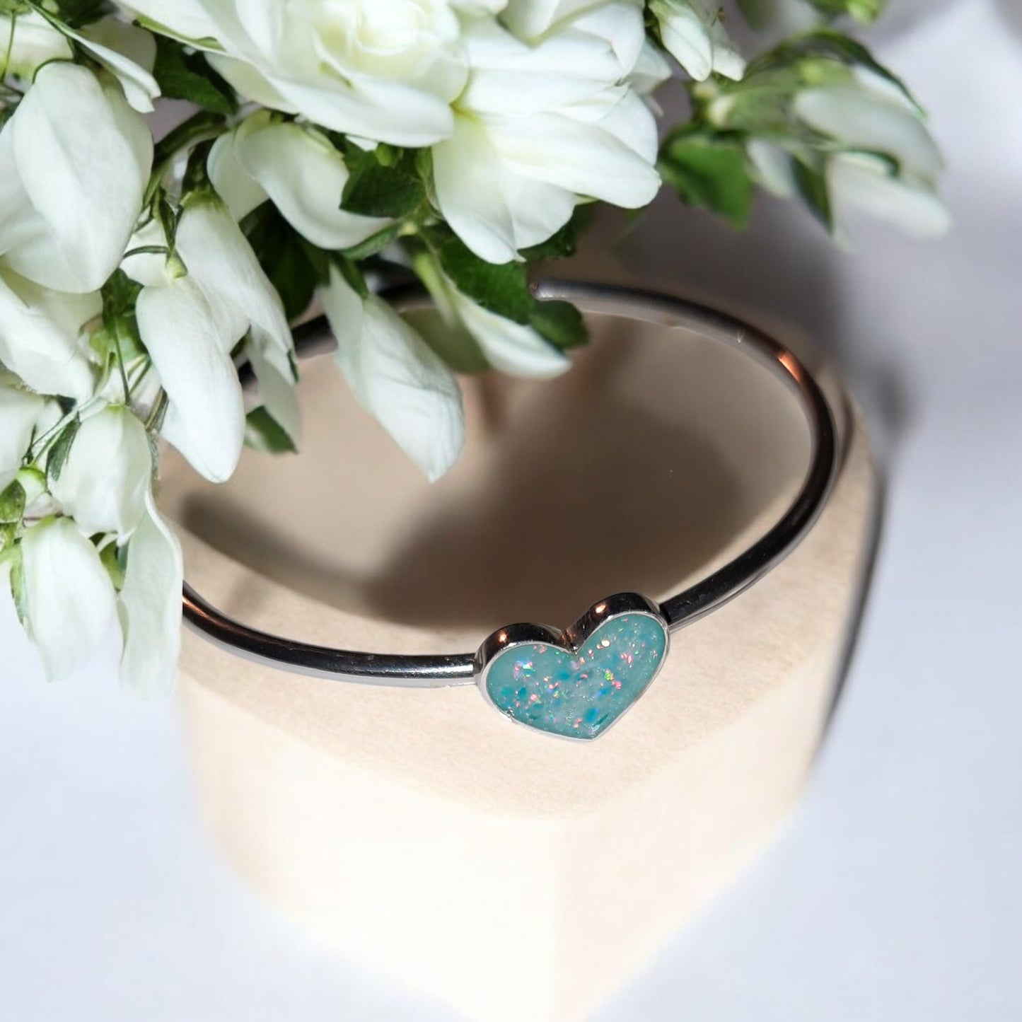 Solid Silver Bangle with Heart shaped setting