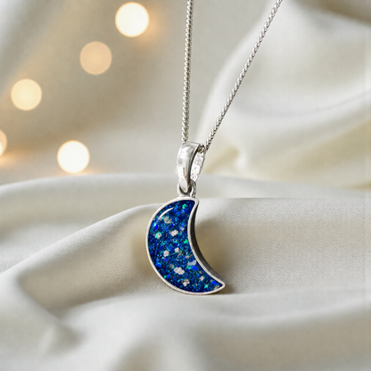 Caph sterling silver moon shaped pendant in sapphire glow, handcrafted in Lancashire UK