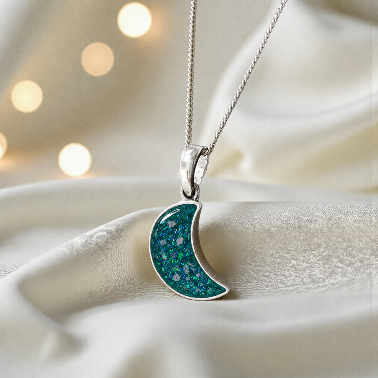 Caph sterling silver moon shaped pendant in teal mist, handcrafted in Lancashire UK