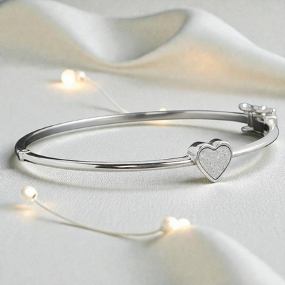 Cassia Heart Bangle — silver heart ashes memorial bangle with grey rainbow opal, handcrafted in Lancashire, UK