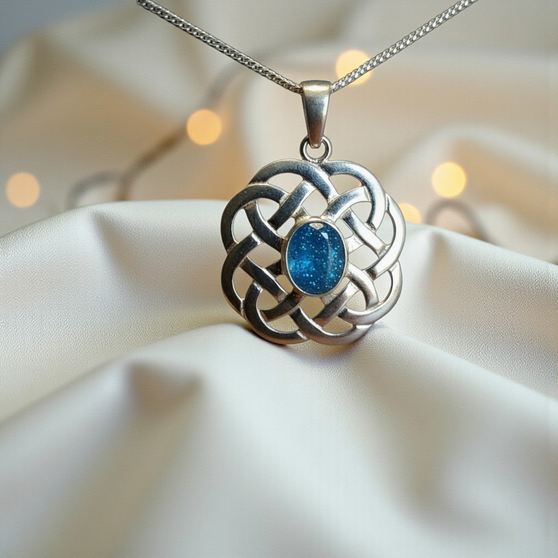 silver celtic ashes pendant, handcrafted in lancashire