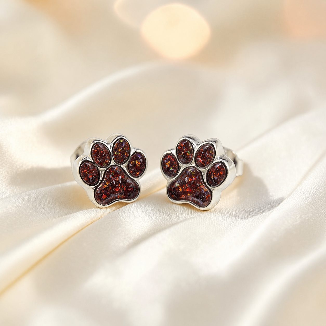 Cleo pet paw memorial ear studs in Copper Mocha opal — sterling silver, handcrafted in Lancashire, UK