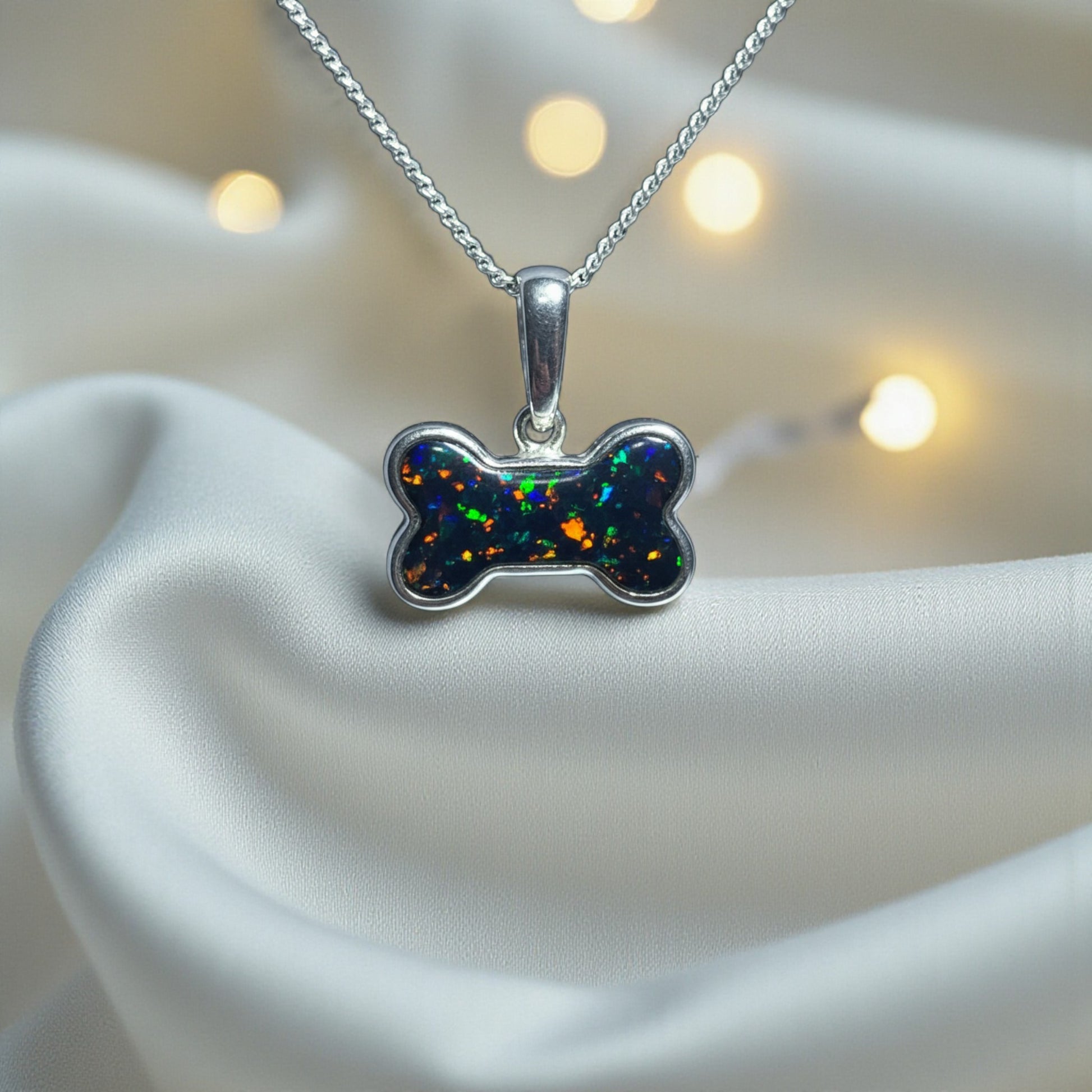 silver dog bone ashes memorial pendant, handcrafted in rossendale 