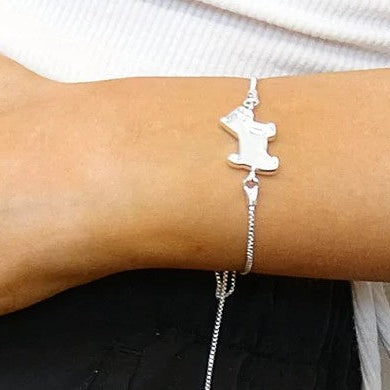 silver dog keepsake bracelet, on wrist uk