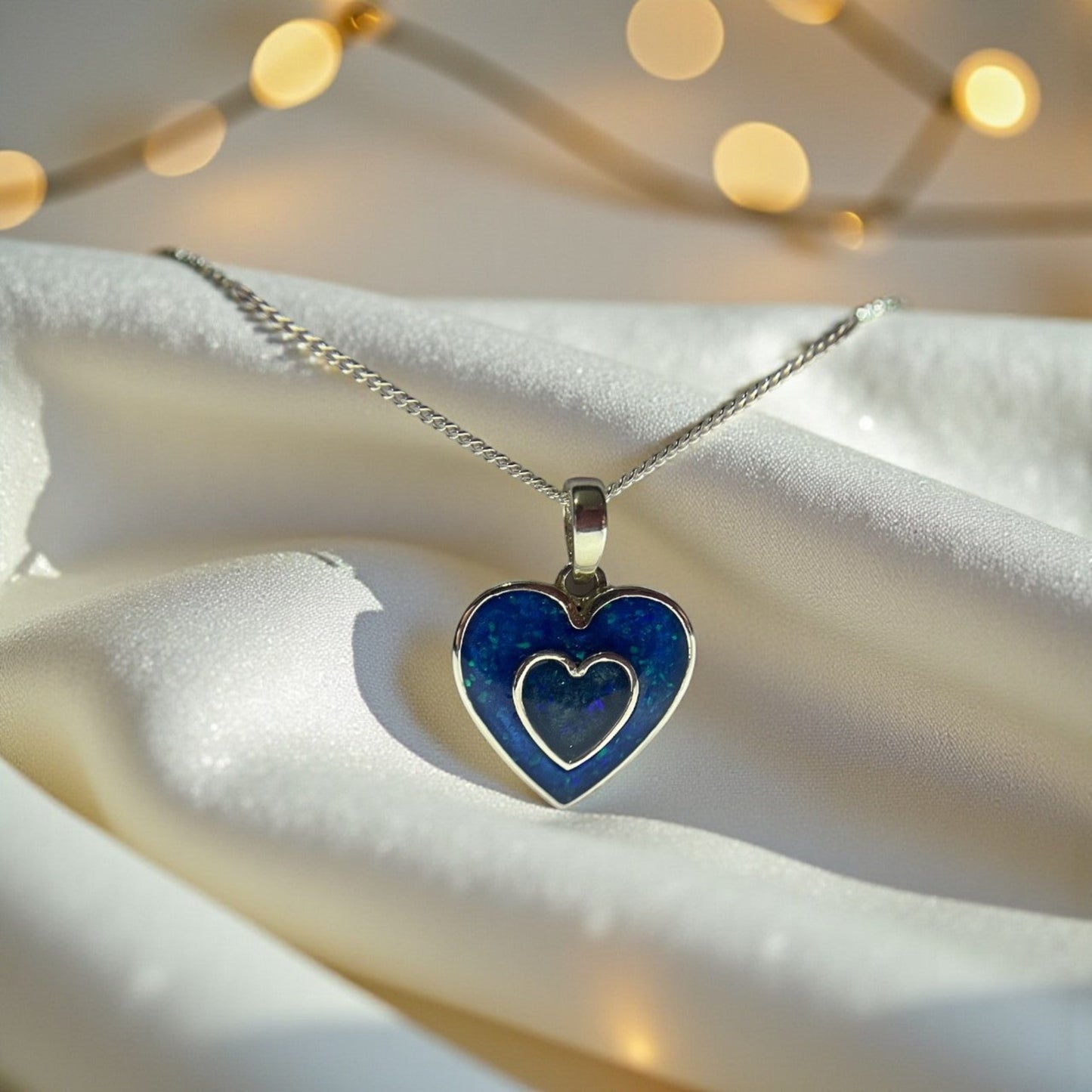 silver double heart ashes pendant, handcrafted in lancashire, uk