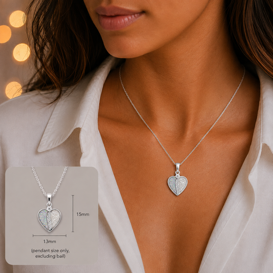 Elara Split heart sterling silver memorial pendant set with cubic zirconia, designed to hold ashes or hair as a keepsake tribute