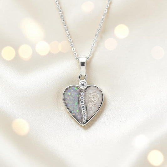 Elara Split heart sterling silver memorial pendant set with cubic zirconia, designed to hold ashes or hair as a keepsake tribute