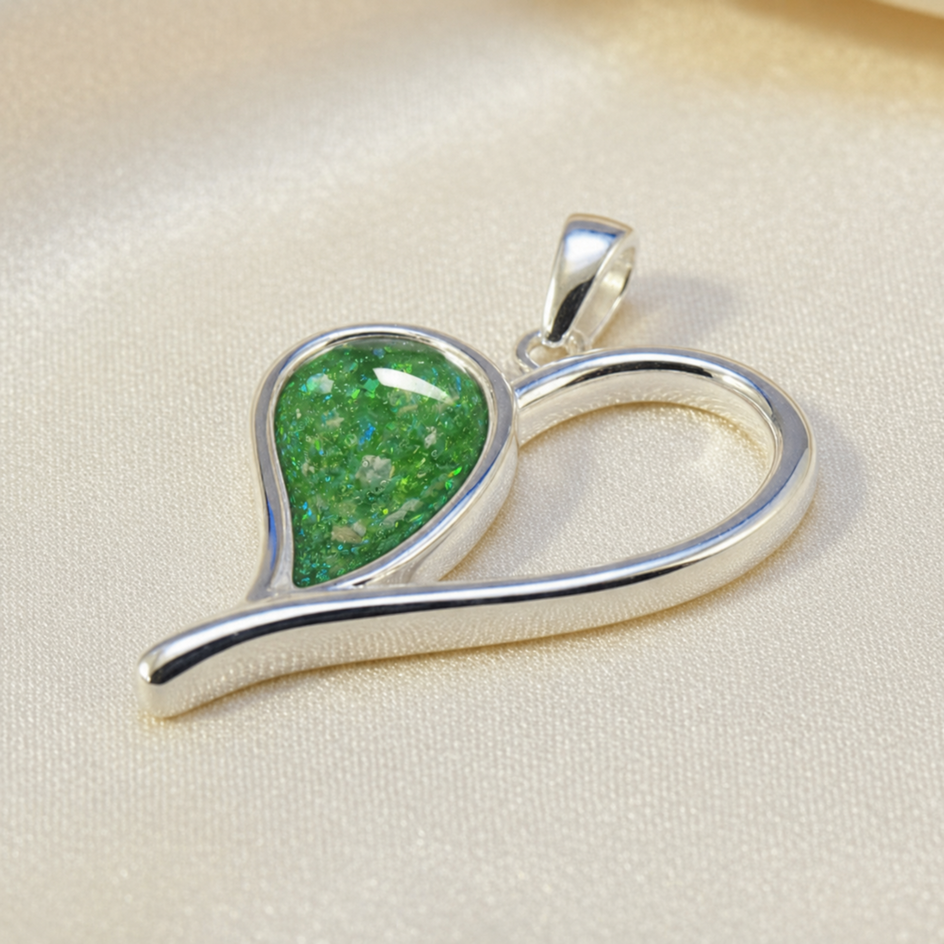 silver heart elnath ashes pendant in fruit green, handcrafted in uk