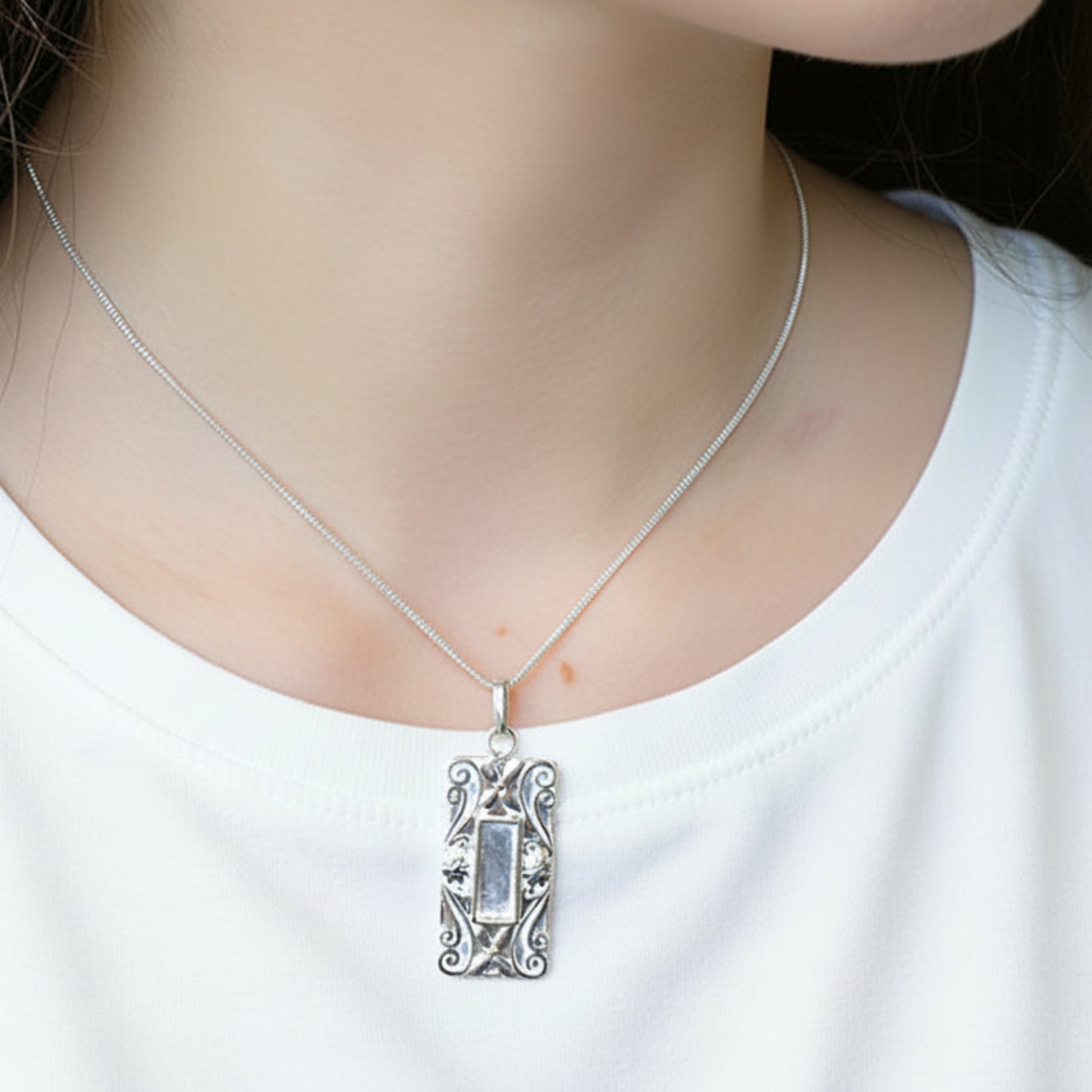 embossed keepsake pendant on model uk