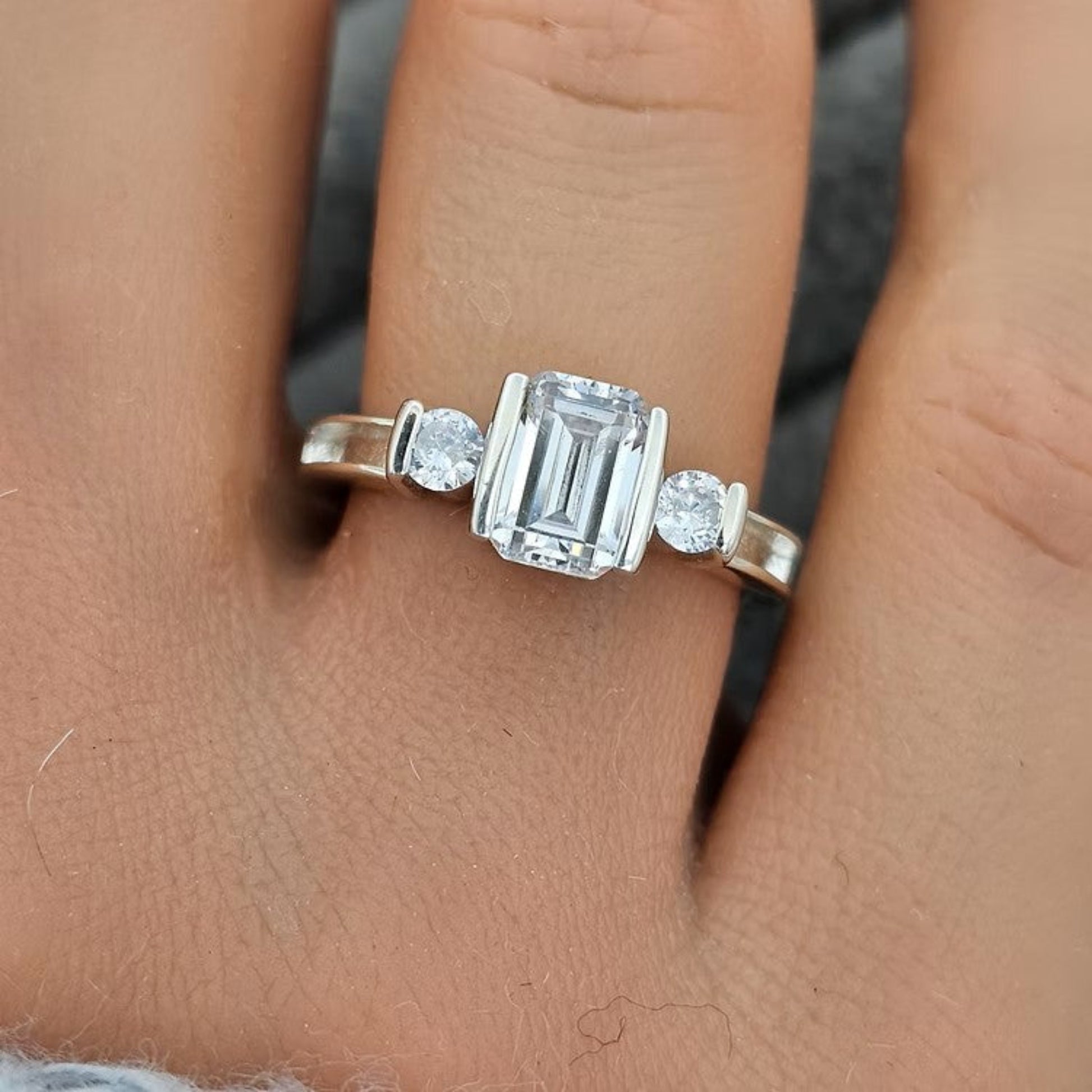 Ariel Ashes Memorial Ring worn on hand — emerald cut sterling silver remembrance ring