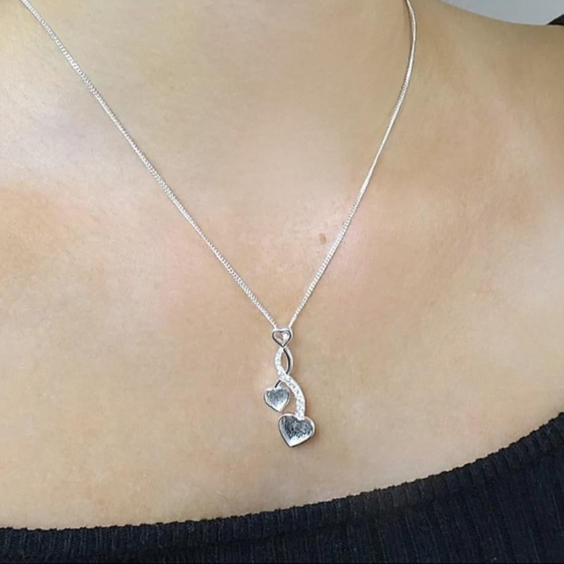 entwinned heart memory pendant uk