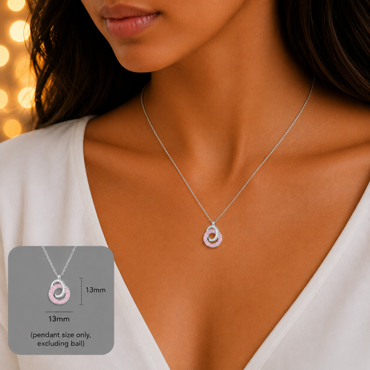 Eternal Embrace Pendant in 925 sterling silver — two interlocking rings with cubic zirconia. Handcrafted memorial jewellery, made in Lancashire Uk -by Keepsake Memorial Jewellery