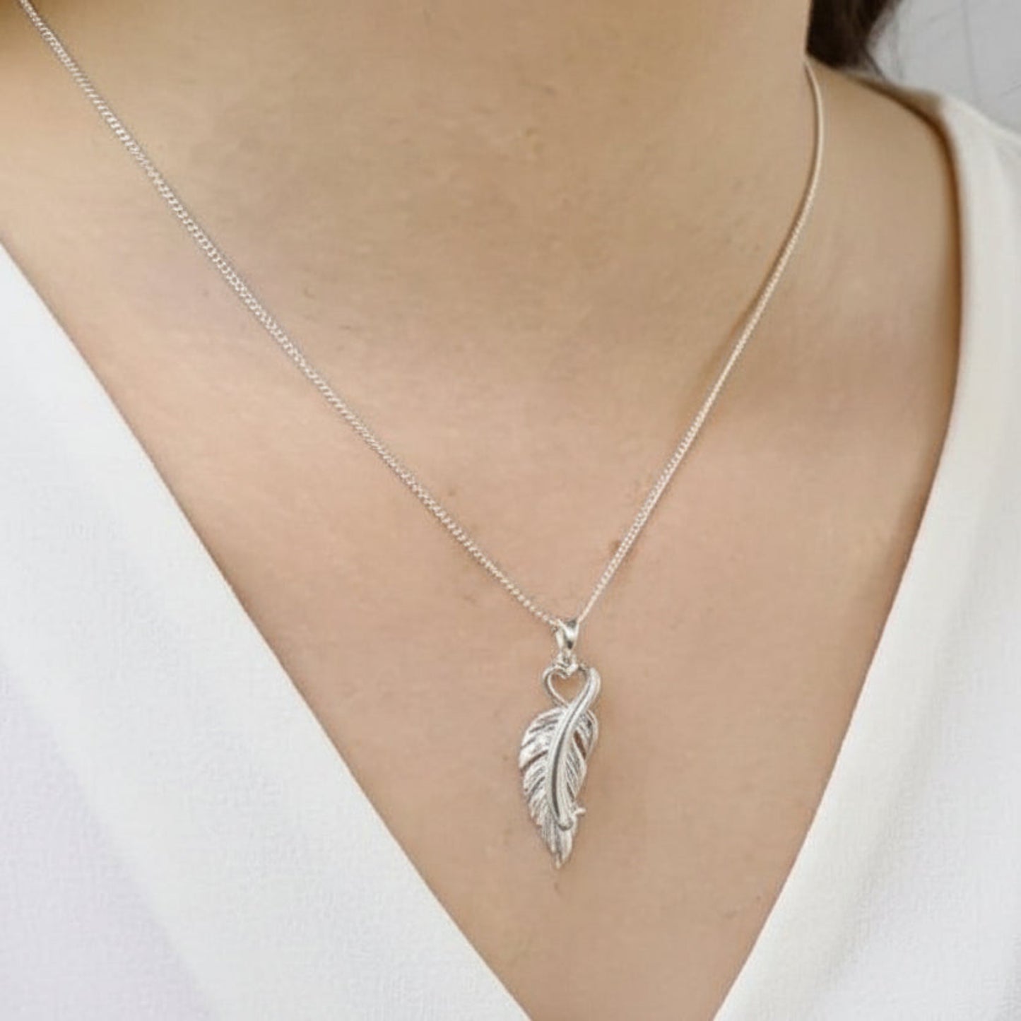 feather ashes pendant on model uk