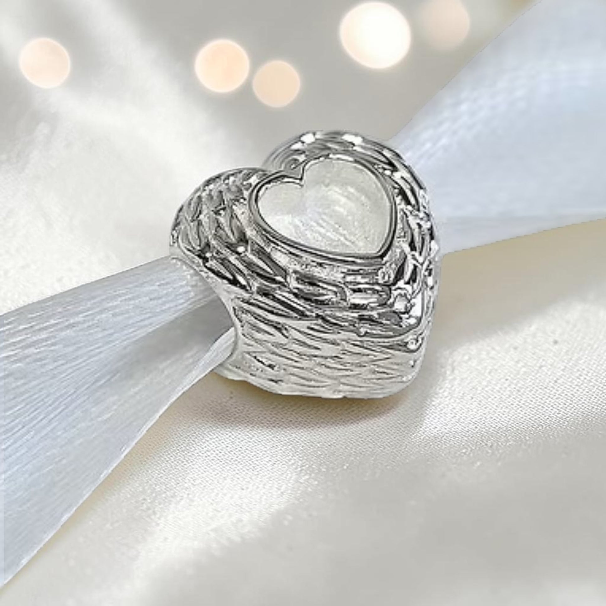 feather Heart Charm — sterling silver feather ashes memorial charm, handcrafted in Lancashire, UK