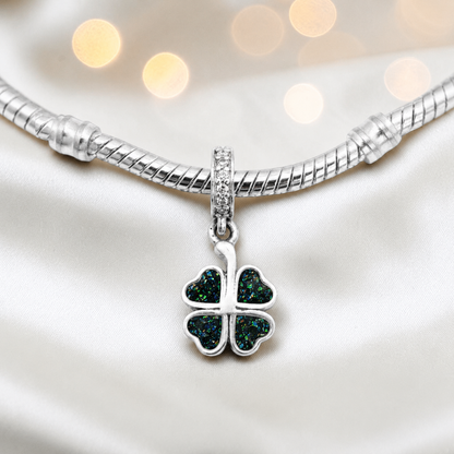Black flame sterling silver clover dangle ashes memorial charm, handcrafted in Lancashire by keepsake memorial