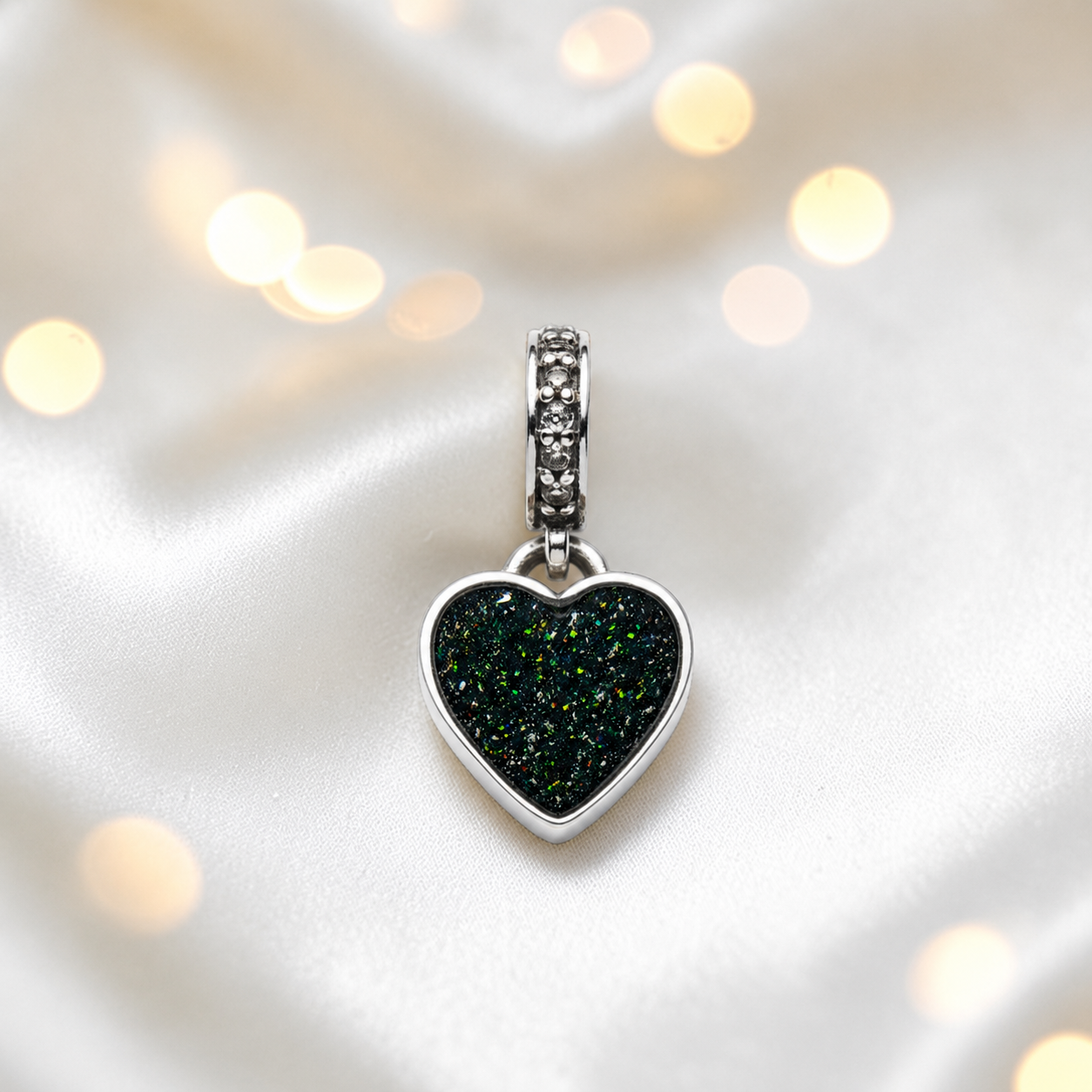Black flame sterling silver heavens heart ashes memorial dangle  charm, handcrafted in Lancashire by keepsake memorial
