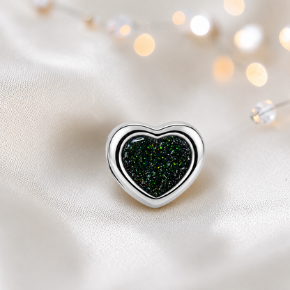 Black flame sterling silver peaceful heart ashes memorial charm, handcrafted in Lancashire by keepsake memorial