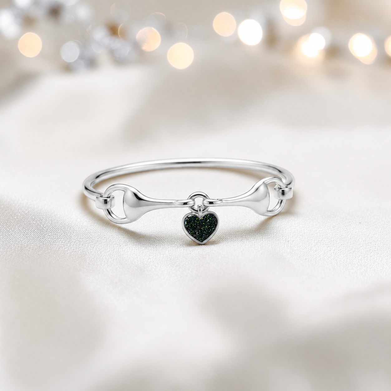 Silver Rocket snaffle bit ashes bangle in black flame,  handcrafted in Lancashire UK - by Keepsake Memorial Jewellery