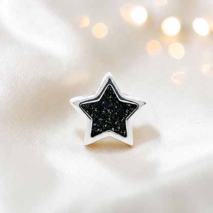 Black flame sterling silver star ashes memorial charm, handcrafted in Lancashire by keepsake memorial