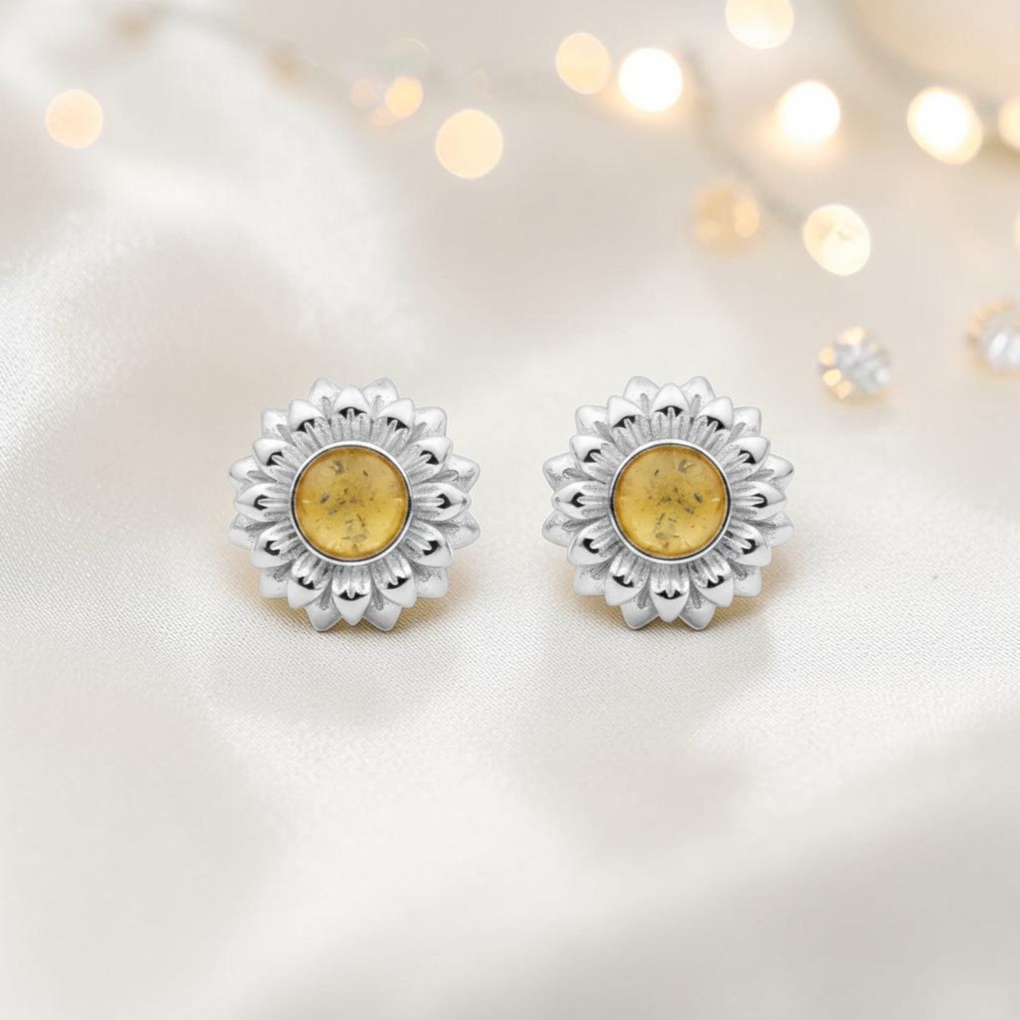 Flora Earrings — silver sunflower ashes memorial stud earrings, handcrafted in Lancashire, UK