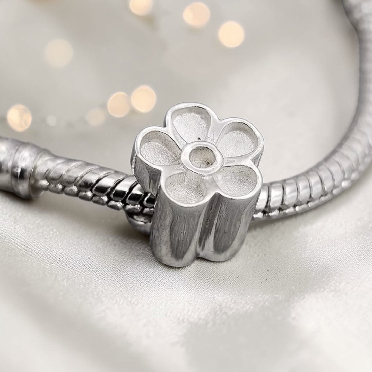 silver flower ashes charm bead, handcrafted in uk