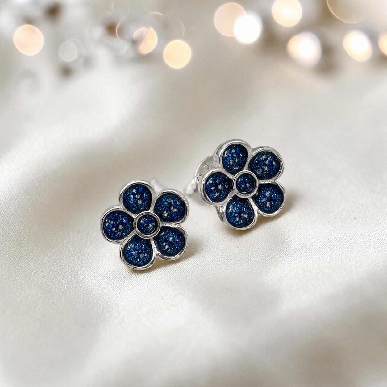 Florals memorial stud earrings in Sapphire Glow opal — sterling silver, handcrafted in Lancashire, UK
