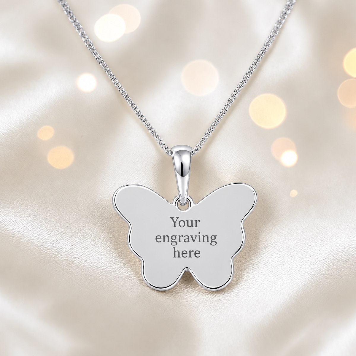 Keepsake Memorial Jewellery, engraving on rear of Foma butterfly pendant, handcrafted in Lancashire