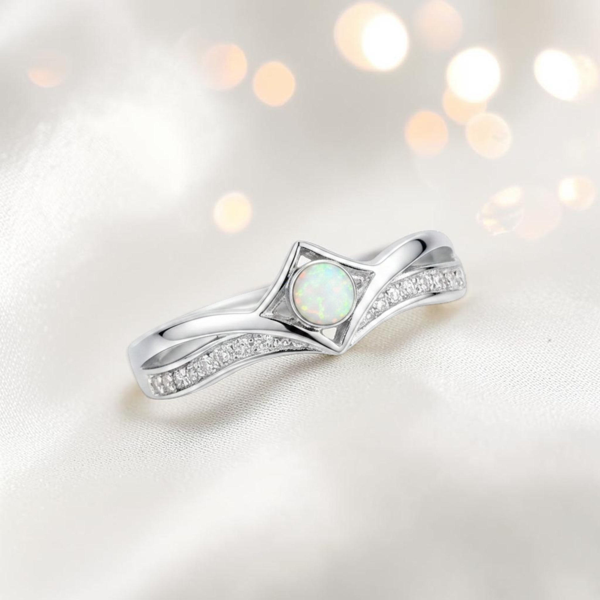 Inverted Wishbone Ring with white snow opal and ash flecks — sterling silver memorial ring, handcrafted in Lancashire, UK
