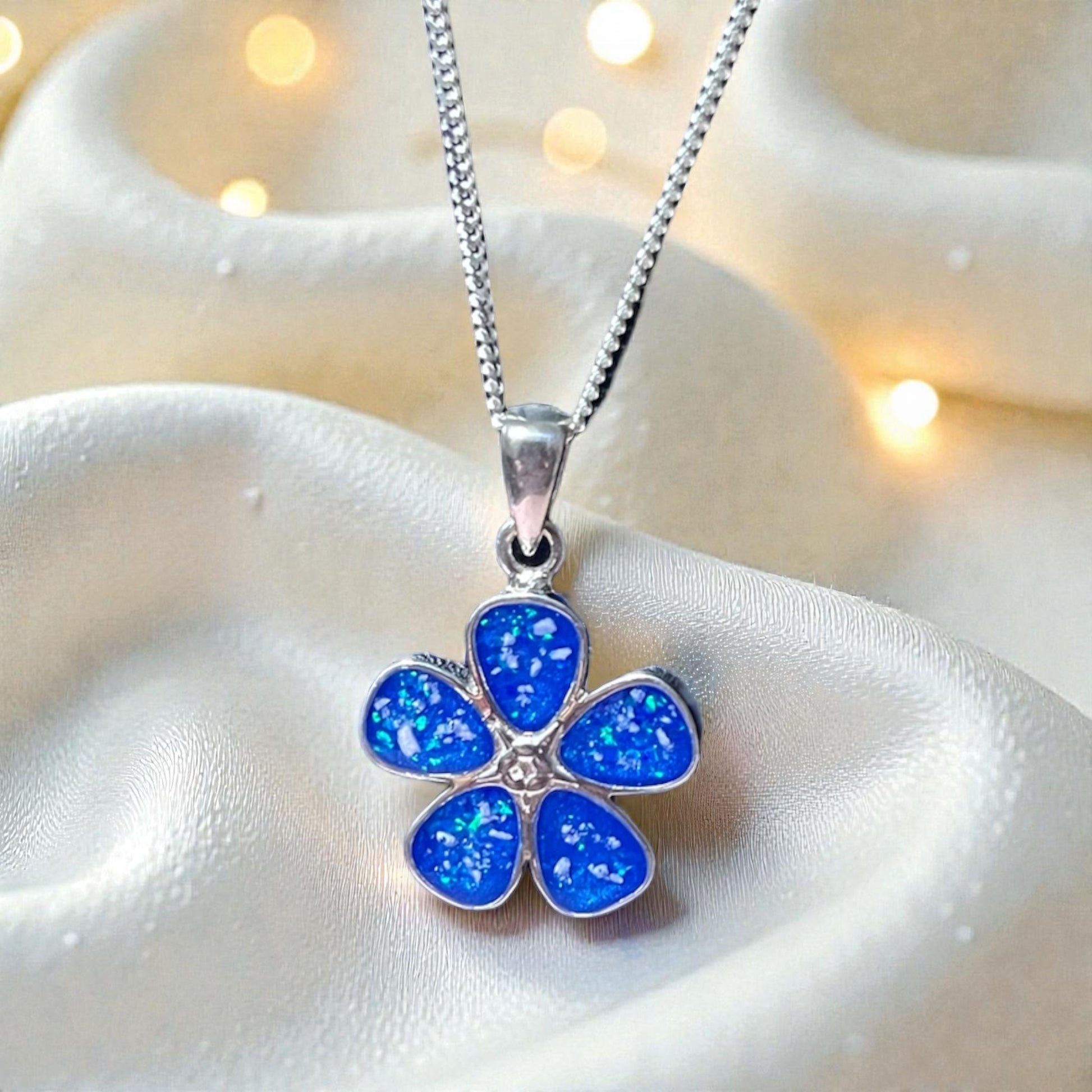 silver forget me not ashes pendant, handcrafted in lancashire, uk