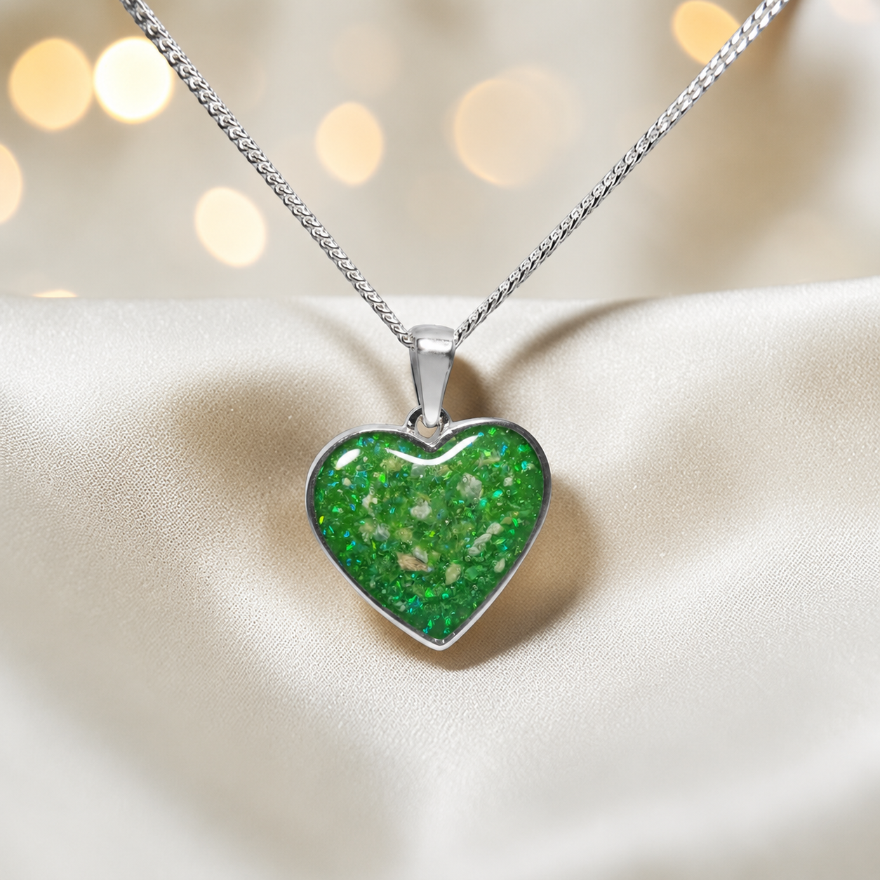 Silver Betel heart ashes memorial pendant in Fruit Green, handcrafted in Lancashire UK