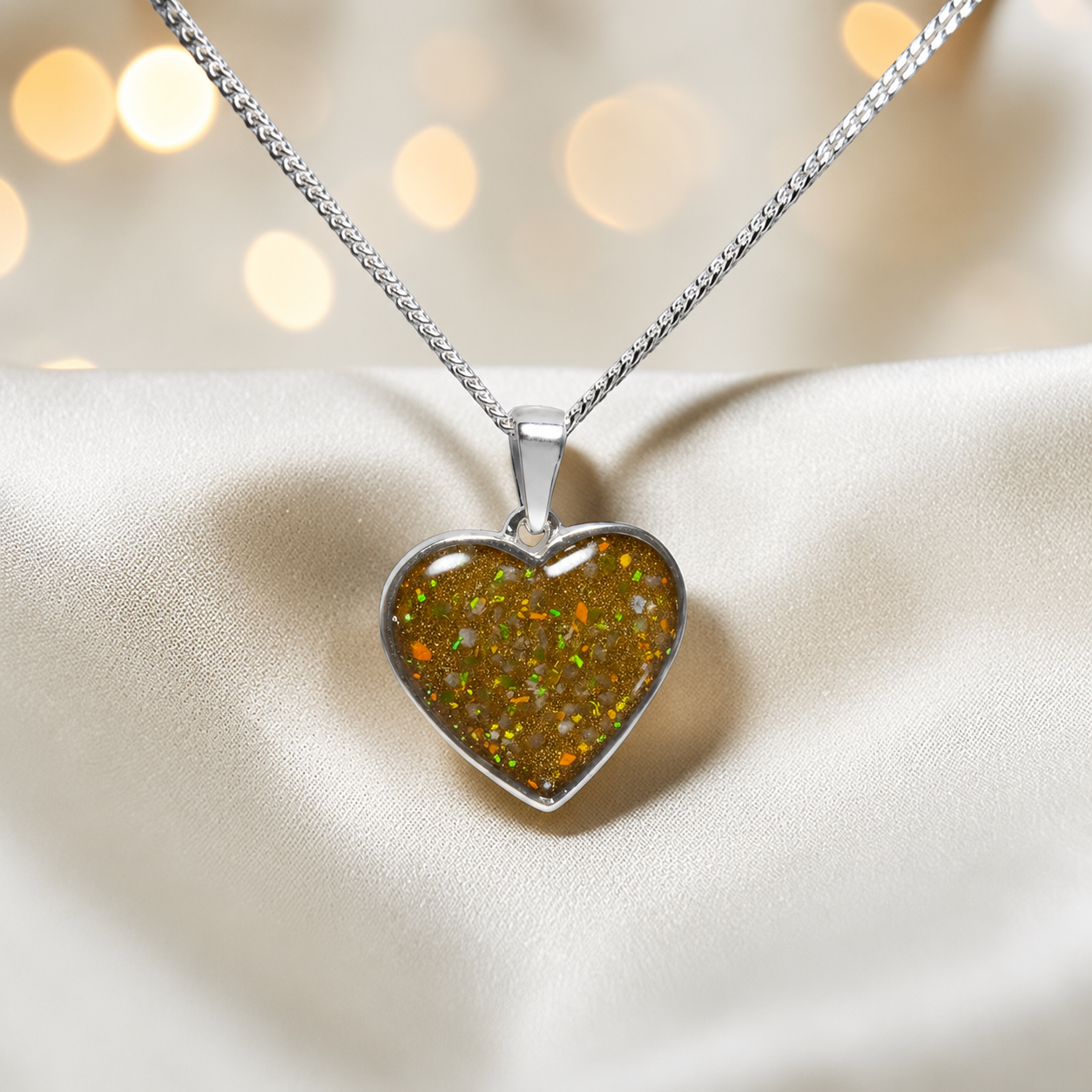 Silver Betel heart ashes memorial pendant in Gold Olive, handcrafted in Lancashire UK