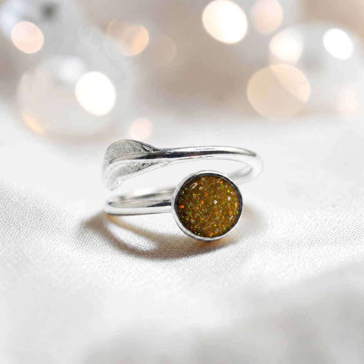 Feather Whisper Ring — silver feather ashes memorial ring, in gold olive, handcrafted in Lancashire, UK