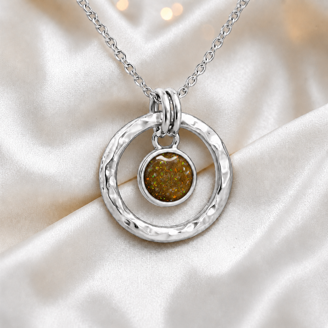 Gold olive hammered hollow circle sterling silver memorial pendant, handcrafted in Lancashire UK by Keepsake Memorial Jewellery
