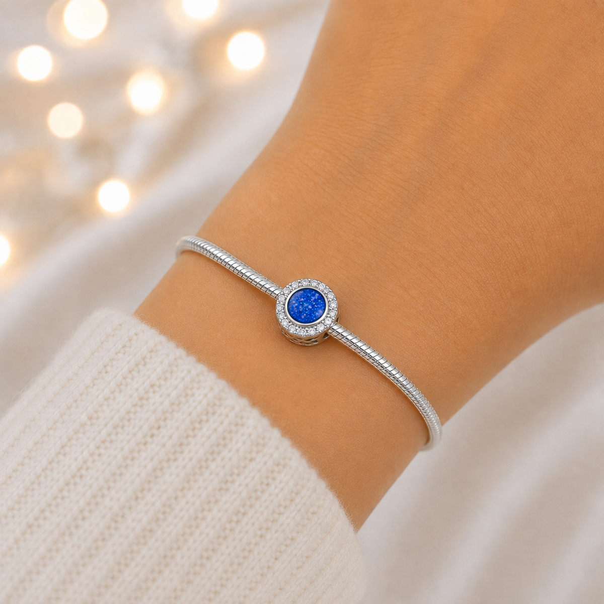 Royal Blue sterling silver halo ashes memorial charm, handcrafted in Lancashire by keepsake memorial