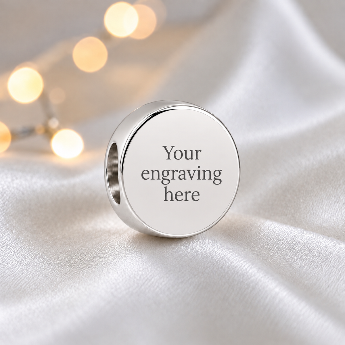 Engraved sterling silver halo ashes memorial charm, handcrafted in Lancashire by keepsake memorial