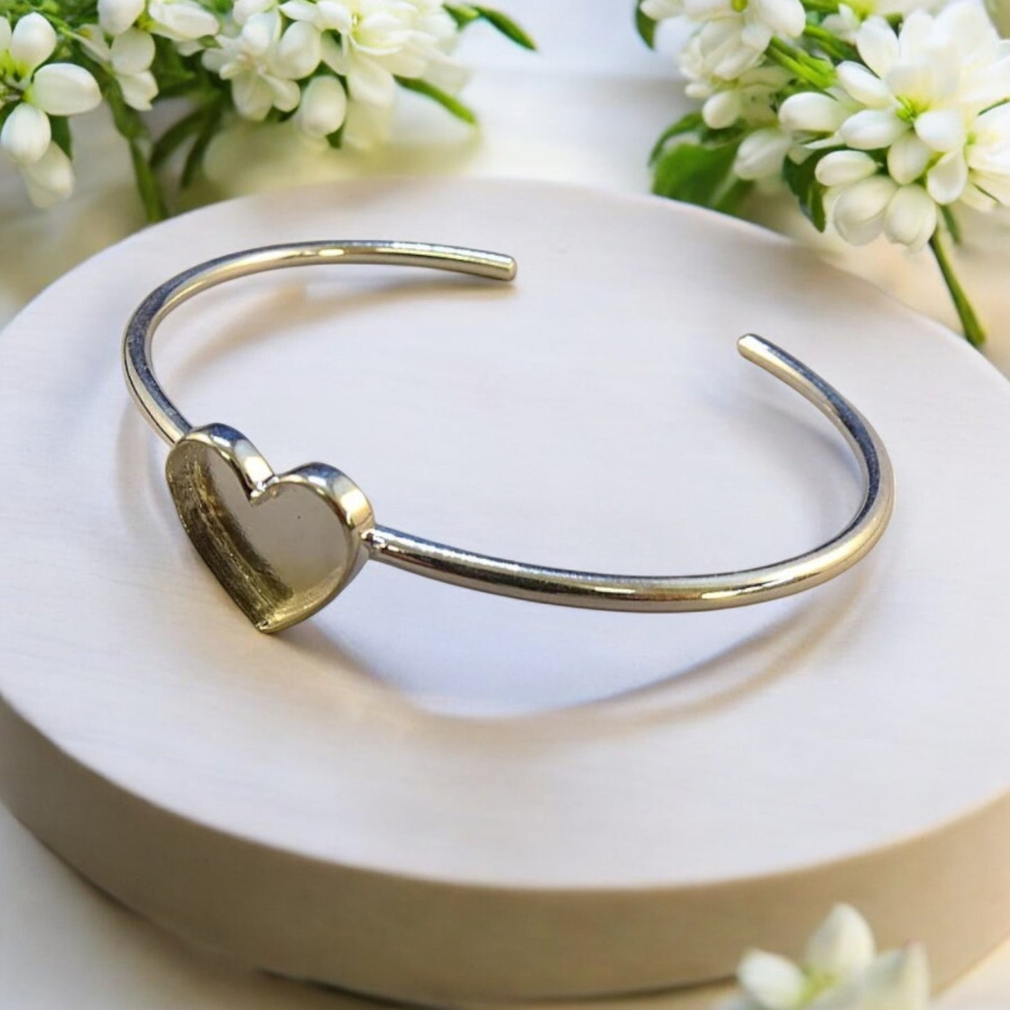 Solid Silver Bangle with Heart shaped setting