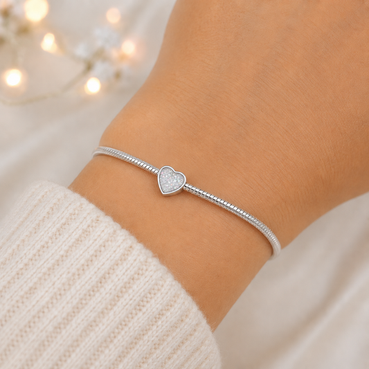 keepsake silver memorial ashes charm, heart shaped. Handcrafted in Lancashire, UK