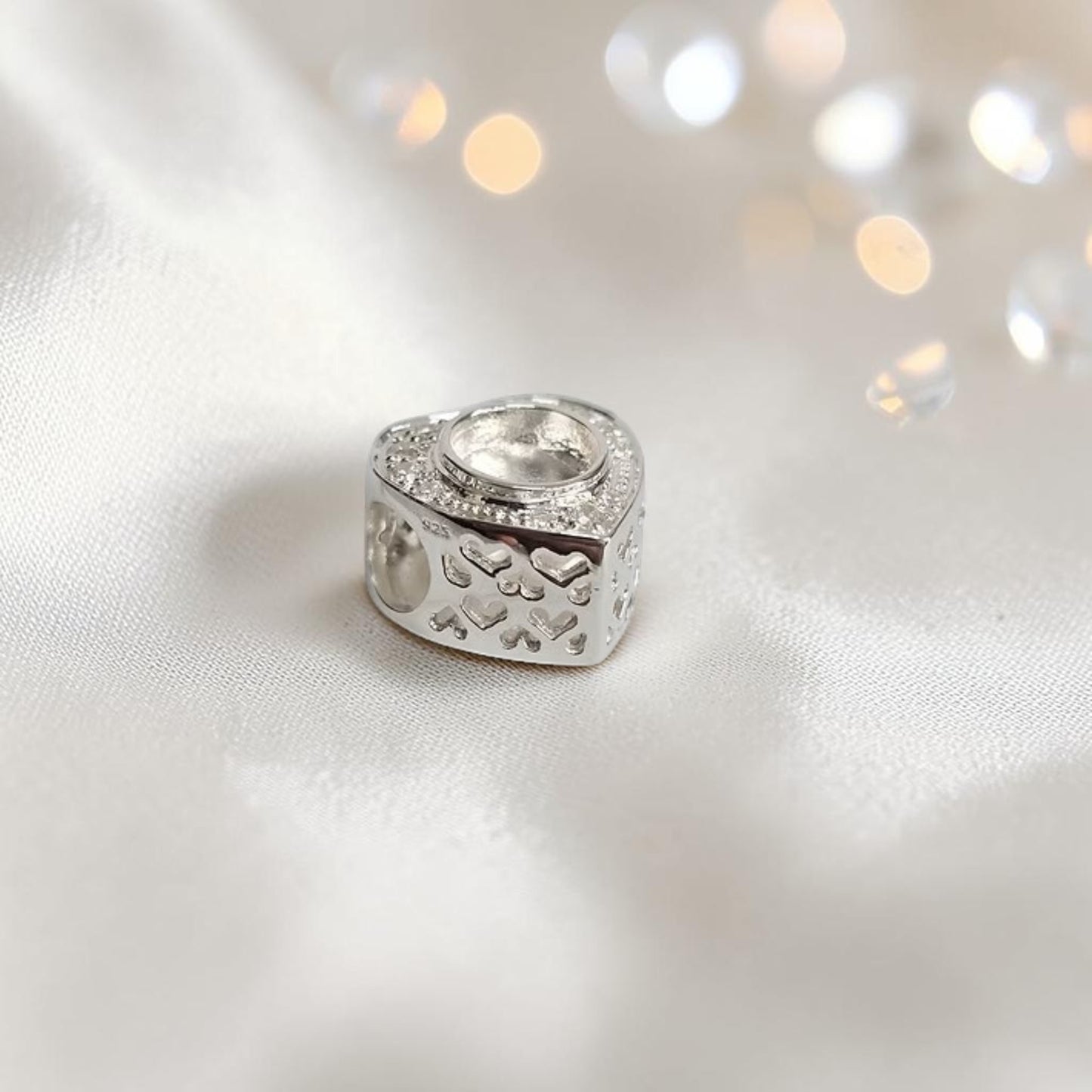 Heart Cut Out Charm — sterling silver CZ ashes memorial charm, handcrafted in Lancashire, UK