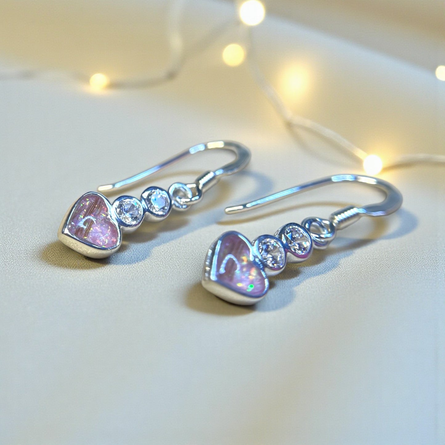 Pleione Earrings — silver heart drop ashes memorial earrings, handcrafted in Lancashire, UK